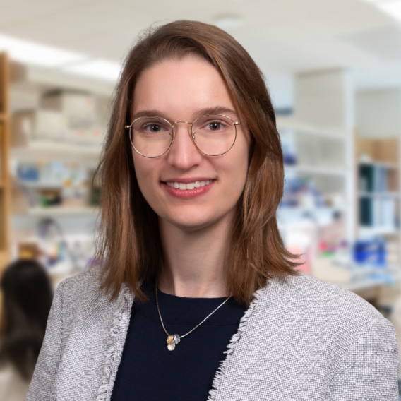 lab member Valerie Etzrodt standing in the lab