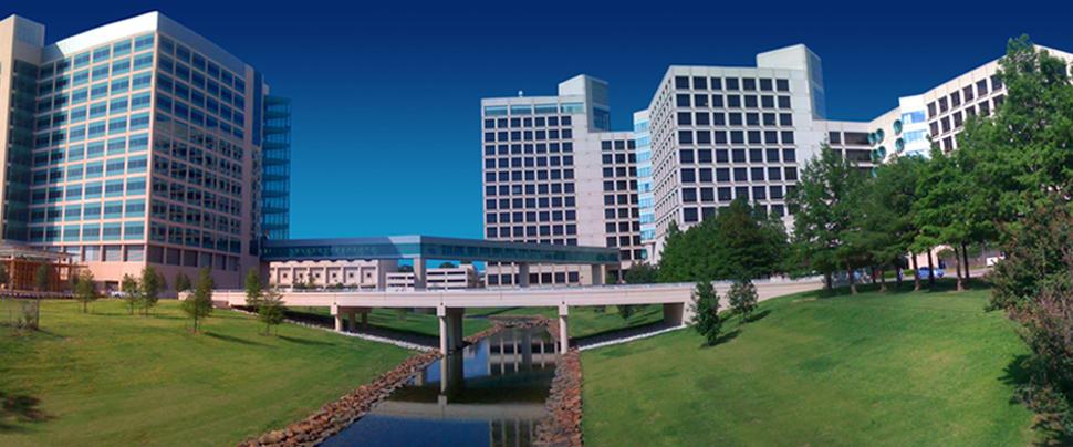 NB building exterior at UT Southwestern. Bridge over a creek connecting two buildings.