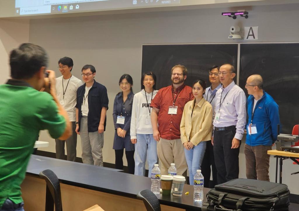 Group of people posing for a photo during a scientific event