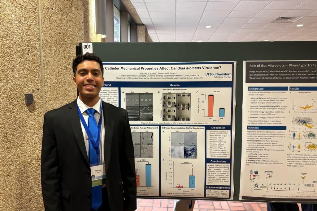 Abhinay Adlooru in front of his research poster at the Seldin Symposium