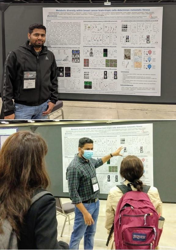 Pravat presenting poster to onlookers