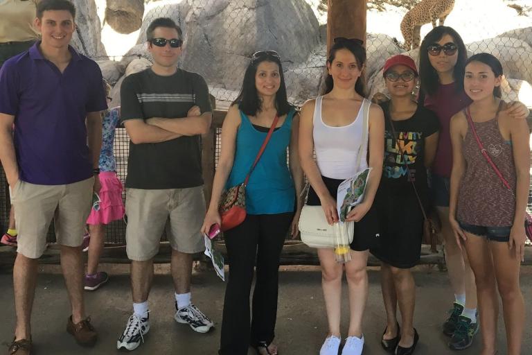 Henne Lab group picture with cheetah at Dallas Zoo