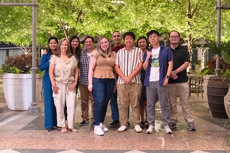 Lab members in a group outside after dinner