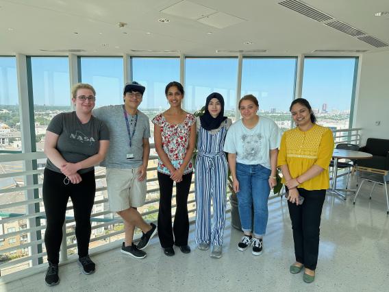 Timea, Abner, Anju, Zehra, Alex, and Maggie and the view from the 12th floor.