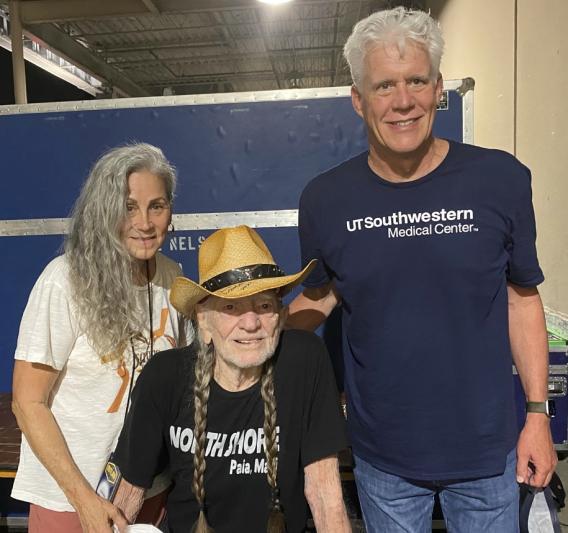Eric Olson backstage with Willie Nelson