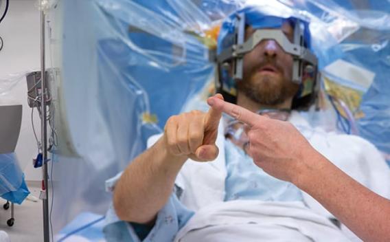Patient playing guitar during brain surgery