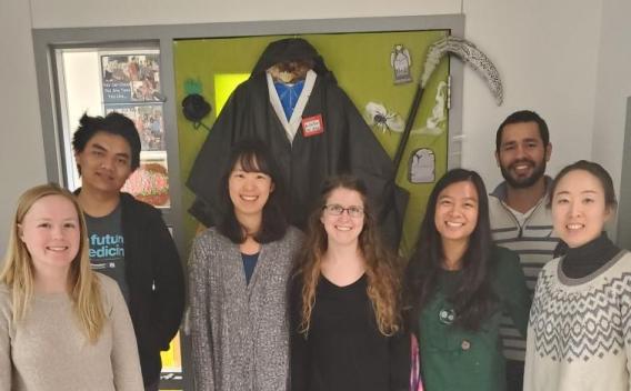 Buszczak Lab Members with grim reaper costume