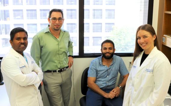 Aguilera Lab team posing in office