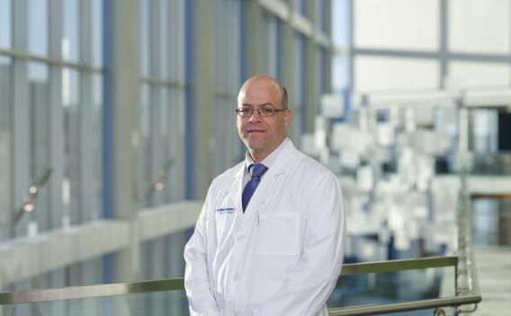 Rafael Ufret-Vincenty, MD, in white coat