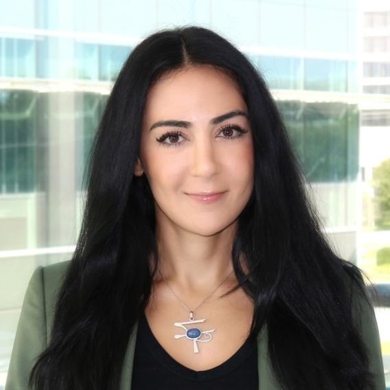Sepeadeh Radpour, Ph.D., a postdoctoral researcher in the MAIA Lab. She's wearing a black shirt and green blazer.