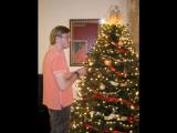 Andrew helping to trim the Christmas tree