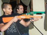 2009 Keystone Meeting - Dr. Mendell shooting toy guns with another lab member