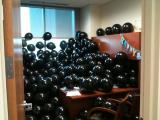 Office filled with black balloons