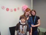 Olga with boy and guest at her Baby Shower