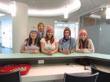 Lab team wearing gifted hats from Peru