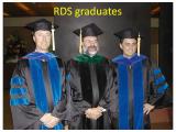 Dr. Mason flanked by two RDS graduates.