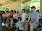 Lab group sitting in pavilion at park