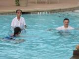 Three team members in pool