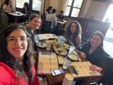 Parikh lab group enjoying a meal at a restaurant during ASN 2022