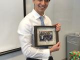 Mahmoud with Framed Mendell Lab Picture