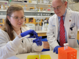 Dr. Nicole DeNisco and Dr. Philippe Zimmern in the lab