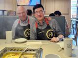 Zhenyu Zhong enjoying hot pot with his mentor, Michael Karin