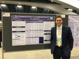 UT Southwestern medical student Paul Parisot presenting his poster at a national meeting.