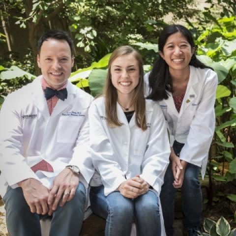 Jeff Bivins, Hope Anderson, Elisa Lin in white lab coats