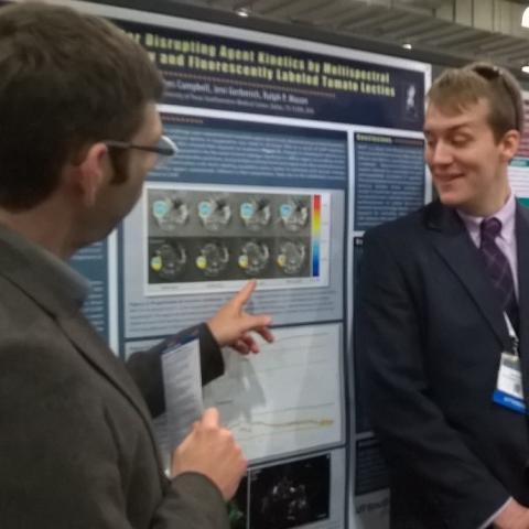 Devin O'Kelly presents his poster at 2016 WMIC in New York.