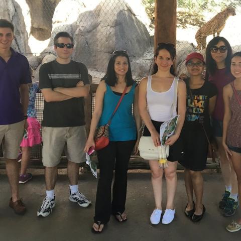 Henne Lab group picture with cheetah at Dallas Zoo