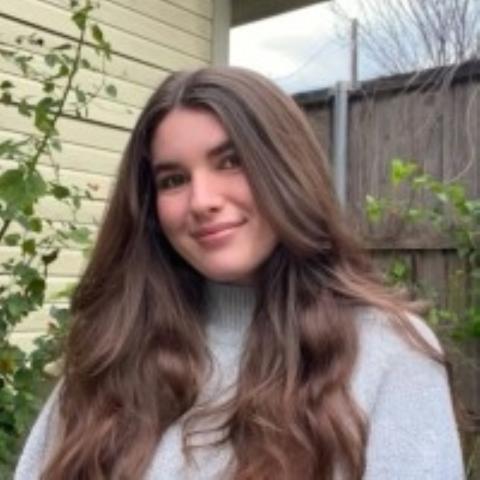 Headshot of Olivia Hudgens